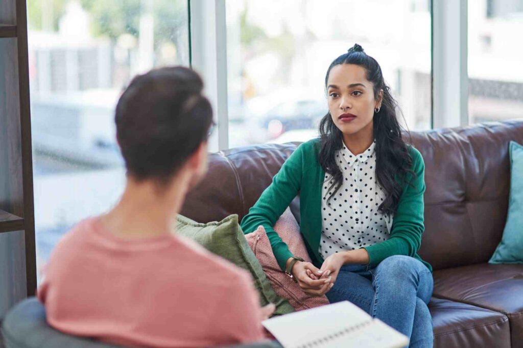 A therapist and a patient discuss how to choose an addiction treatment program
