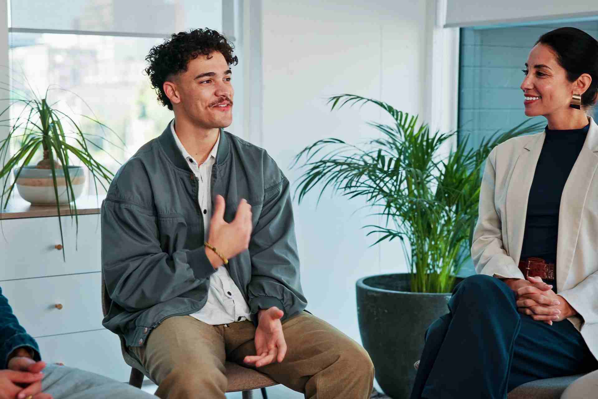 Client discussing treatment options with a counselor during a detox assessment before entering rehab